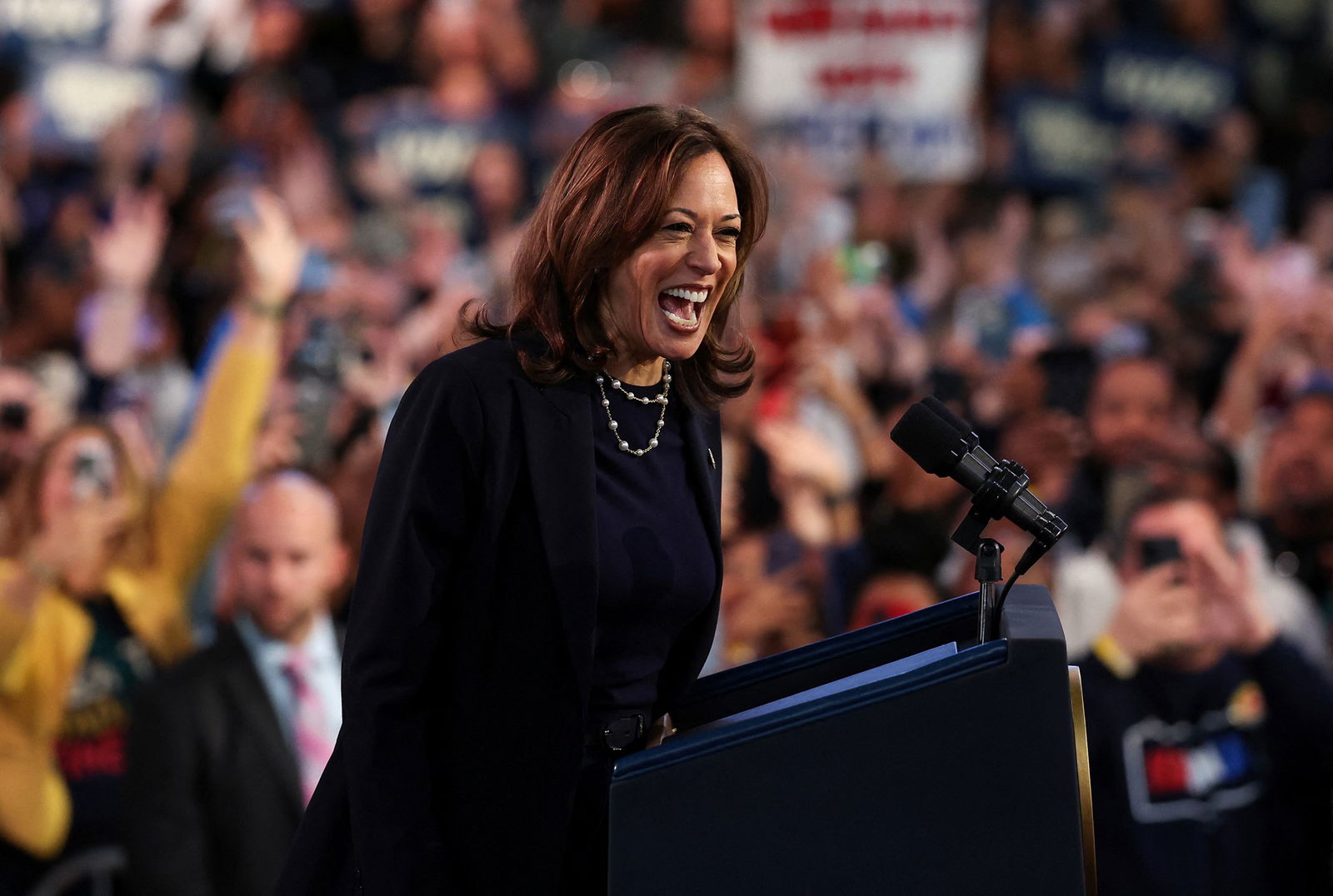 Kamala Harris laughs on stage