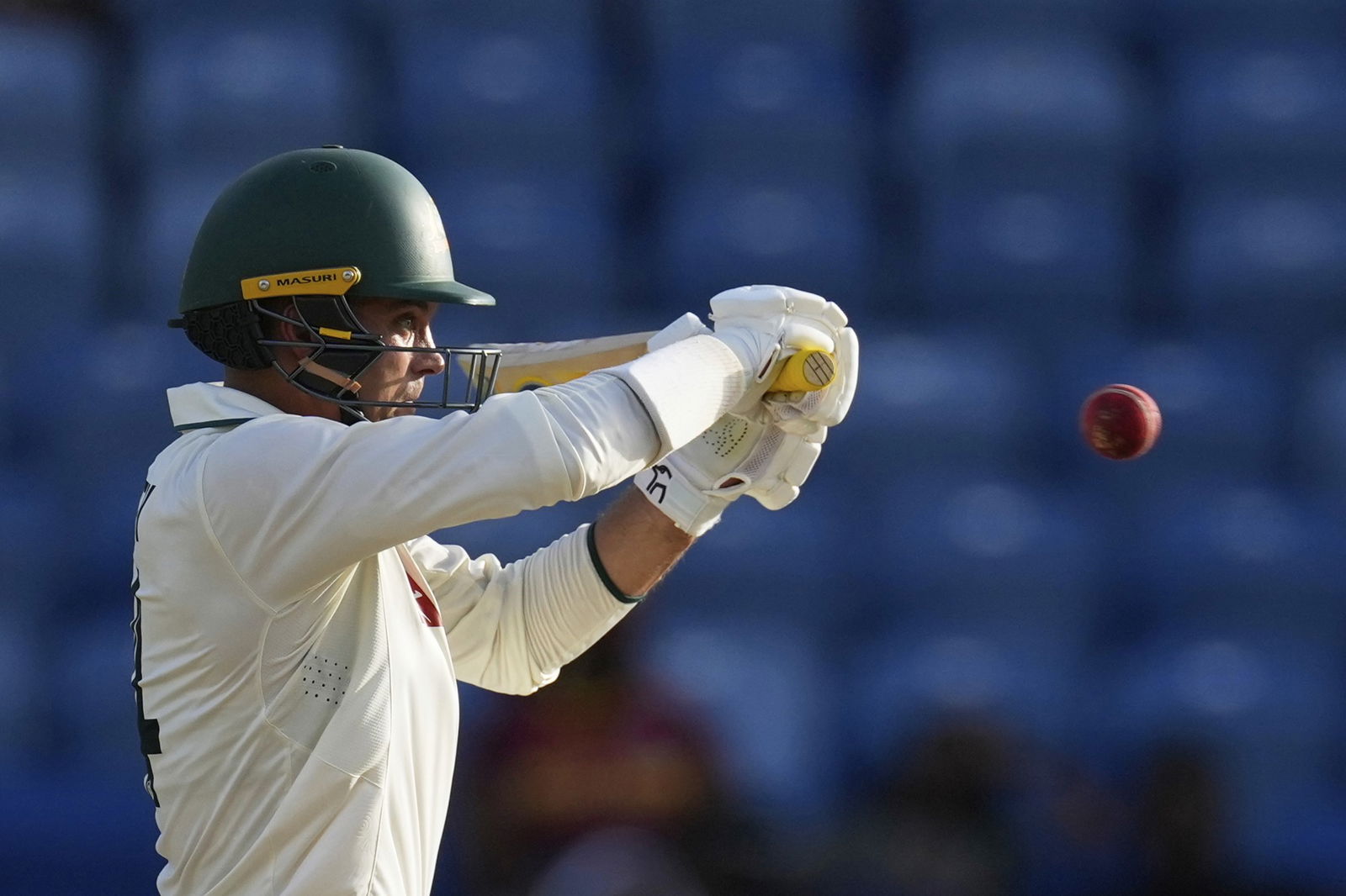 Alex Carey prepares to hit a cricket ball