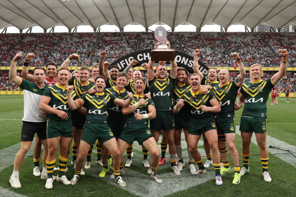 Australia Kangaroos lift the Pacific Championships trophy.