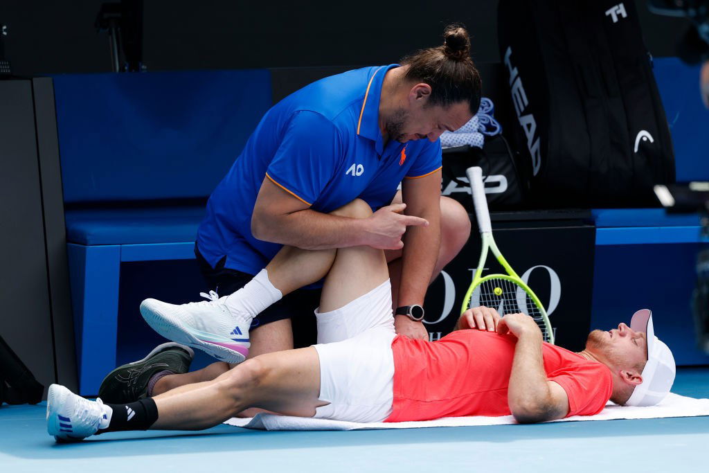 Alejandro Davidovich Fokina is treated for an injury at the Australian Open.