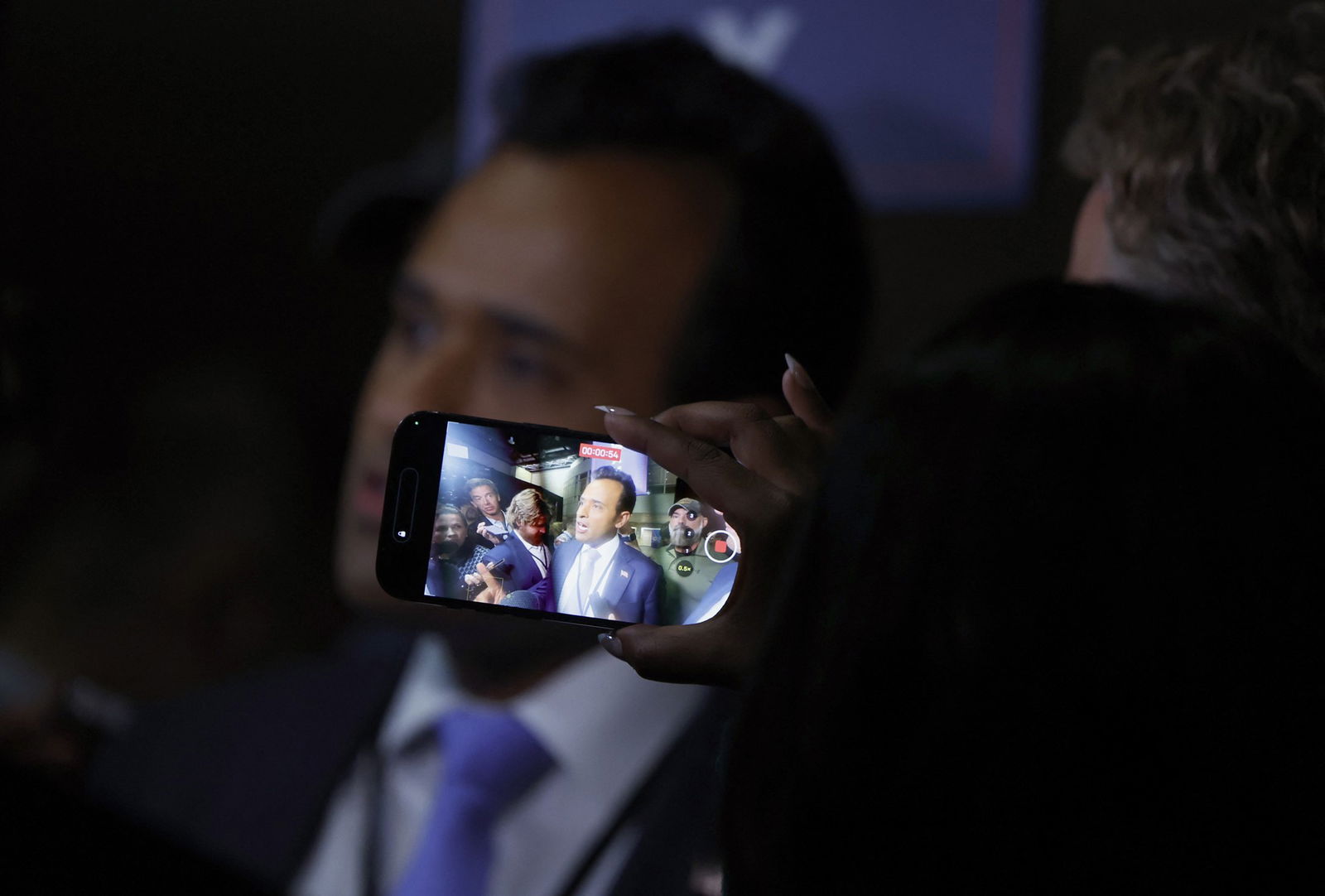 Vivek Ramaswamy speaks to reporters after the debate