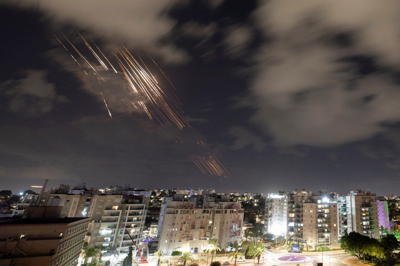 Multiple flashes in a night sky.