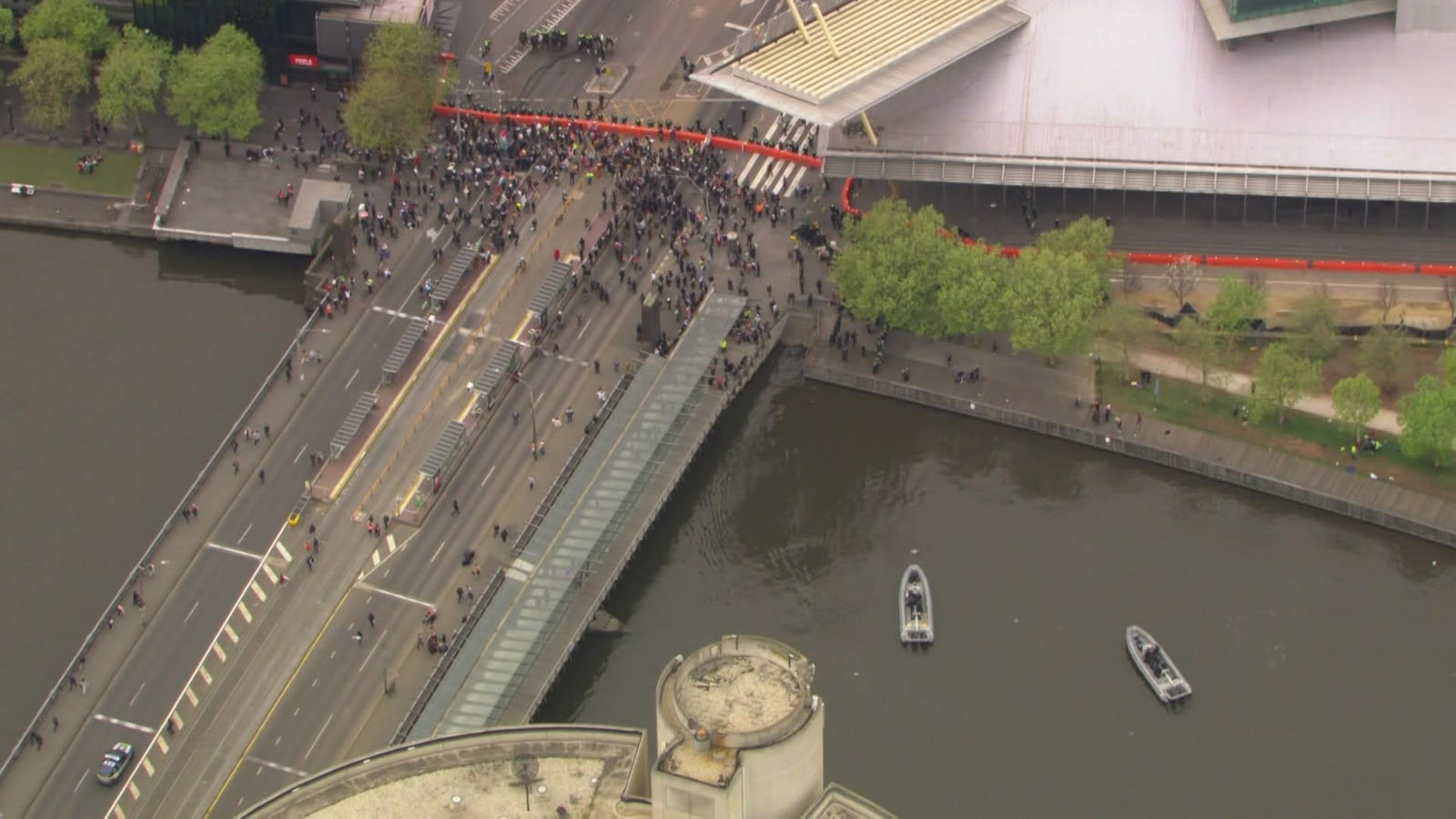 Boats patrolling the Yarra River near the MCEC