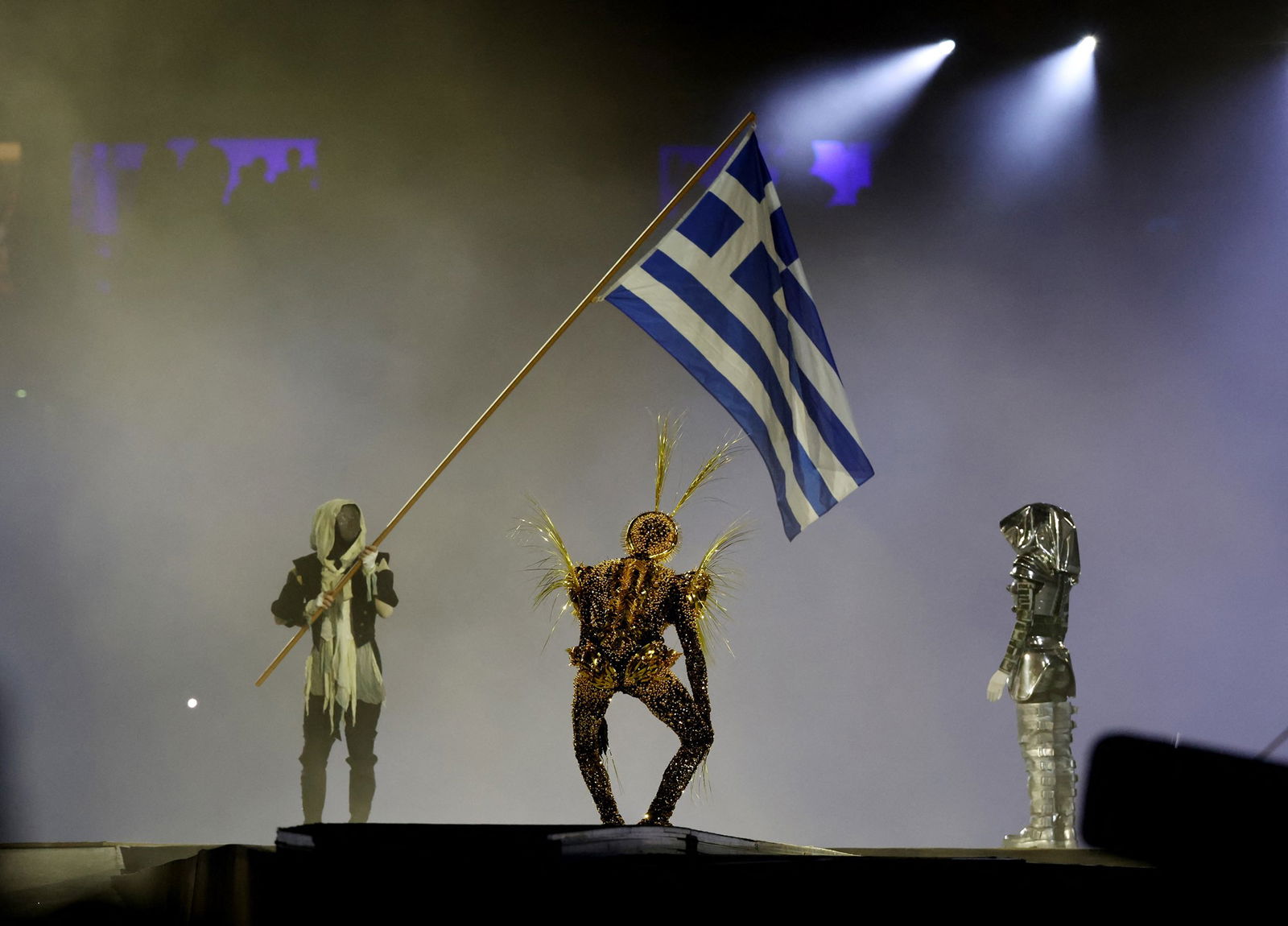 The Greek flag bearer and golden person