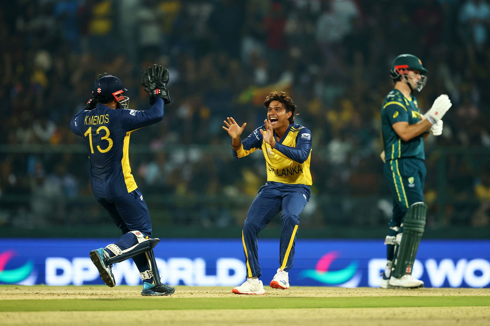 Dunith Wellalage celebrates with Kusal Mendis after the stumping of Cam Green.