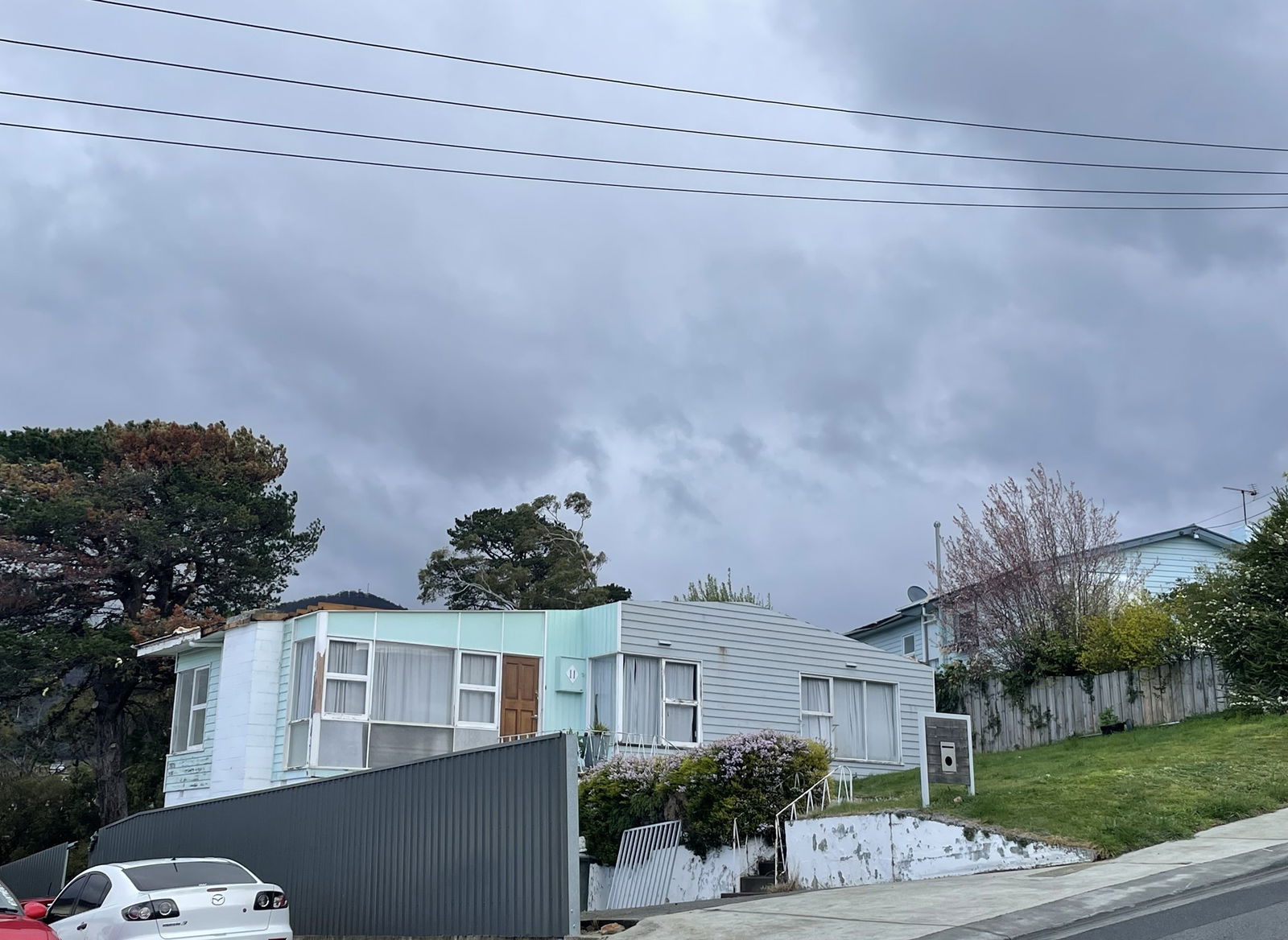 A suburban house with no roof.