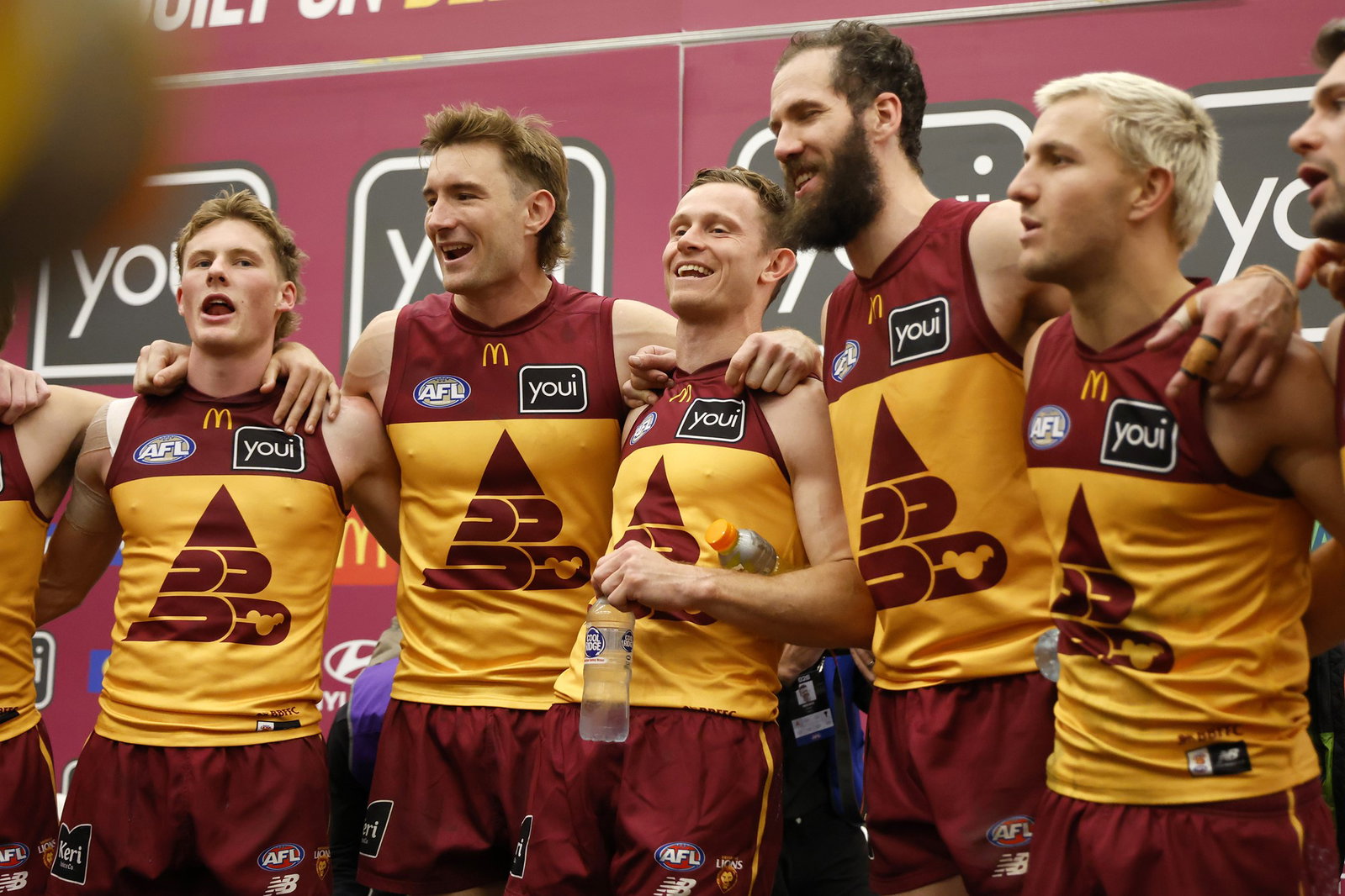 Brisbane Lions players sing their song after the win during the round 19 AFL match between West Coast Eagles and Brisbane Lions at Perth Stadium, on July 18, 2026, in Perth, Australia. (Photo by James Worsfold/Getty Images)