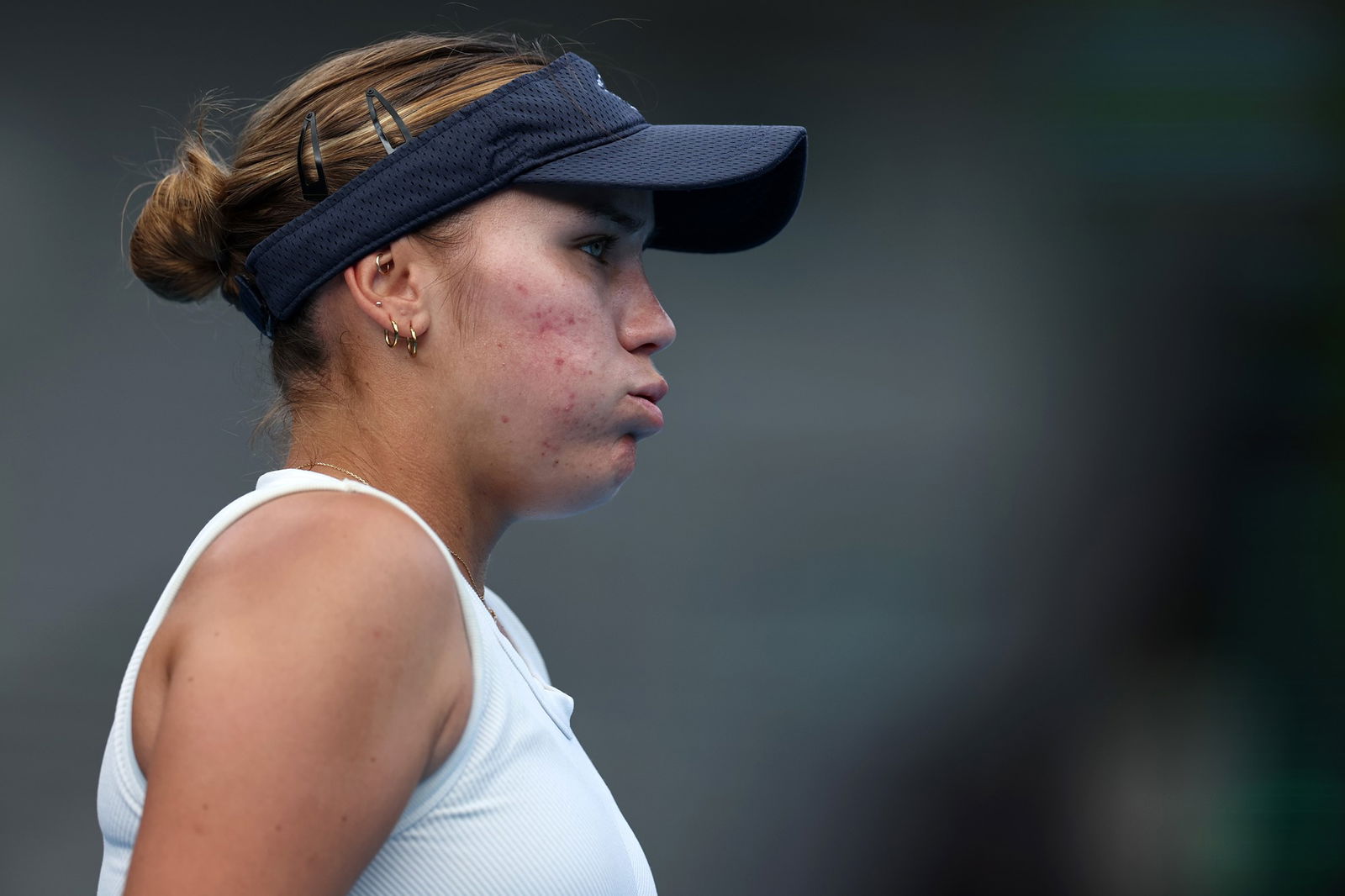 Sofia Kenin reacts between points.