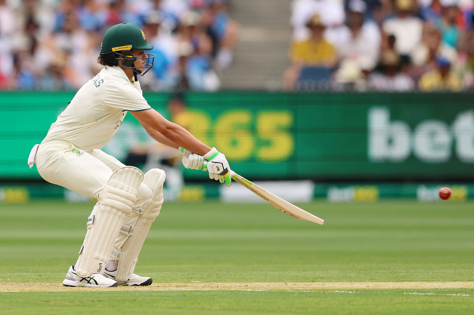 Sam Konstas plays a cricket shot.