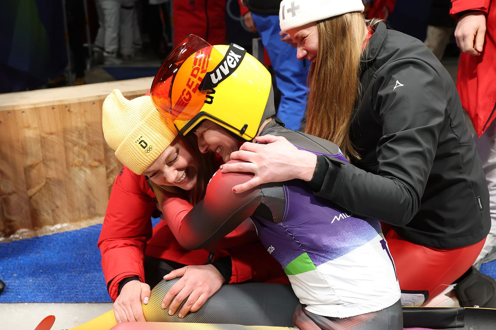 Julia Taubitz of Team Germany celebrates winning the gold medal after competing in the Women's Singles Run 4 on day four of the Milano Cortina 2026 Winter Olympic games at Cortina Sliding Centre on February 10, 2026 in Cortina d'Ampezzo, Italy.