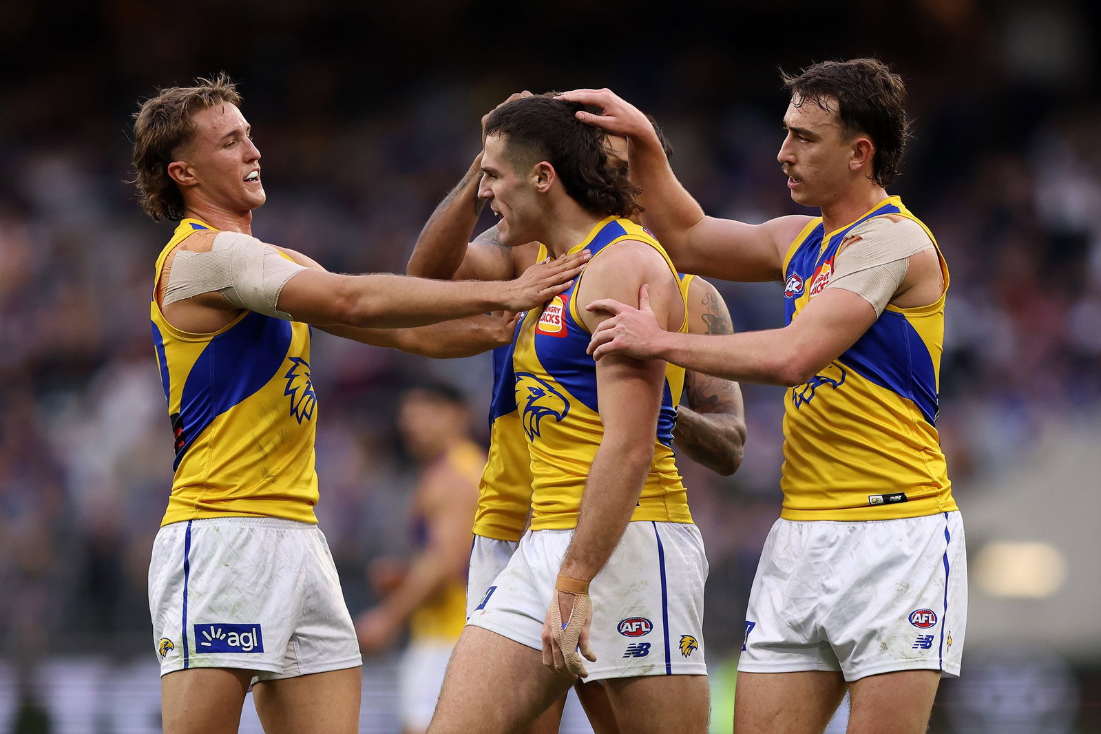 Jake Waterman (centre) missed a late set shot that would have given West Coast the lead with 30 secnds remaining.