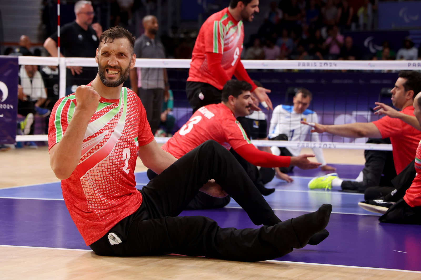 Morteza Mehrzadselakjani of Team Islamic Republic of Iran celebrates his team winning gold during the Sitting Volleyball Men's Gold Medal match.