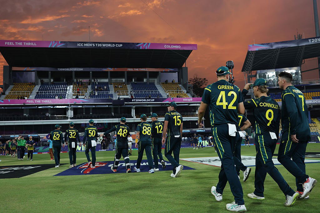 Australian players leave the field