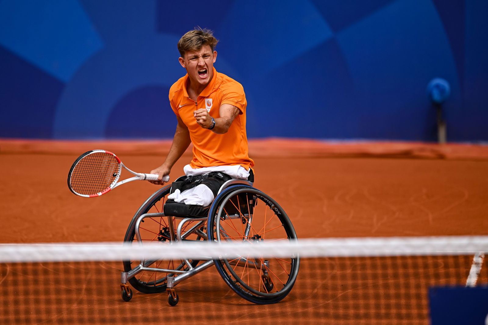 Netherland's Niels Vink reacts against Turkiye's Ahmet Kaplan in men's quad wheelchair tennis singles semifinal in Paris.