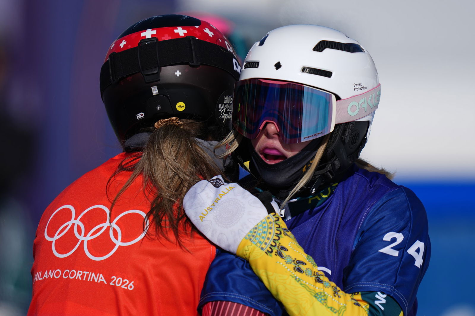 Abbey Wilson embraces a rival.