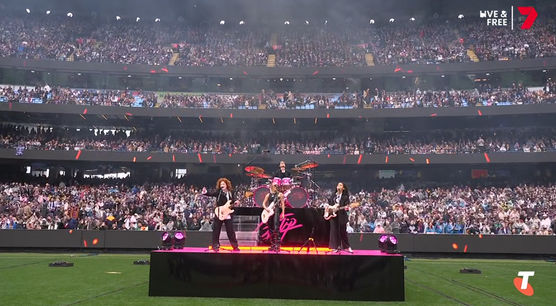 GFlip on stage with her band at the MCG.