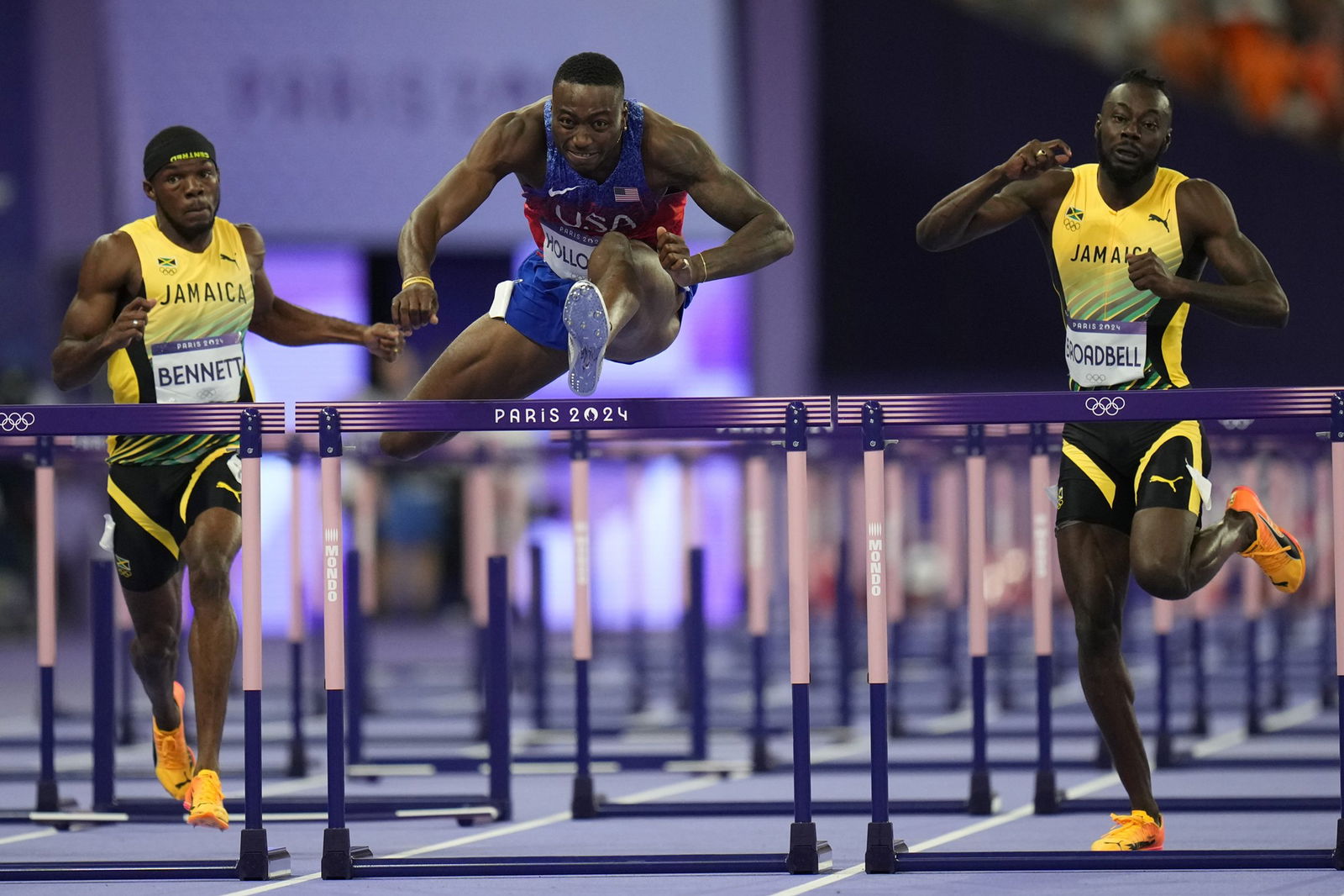 American Grant Holloway runs to victory in the men's 110m hurdles final.