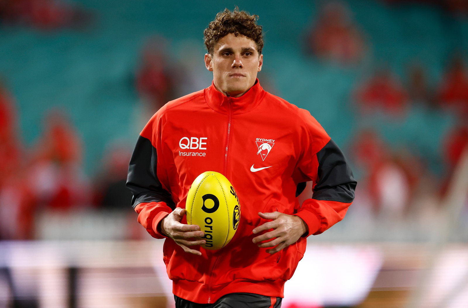 Charlie Curnow warms up ahead of the preliminary final against Fremantle.