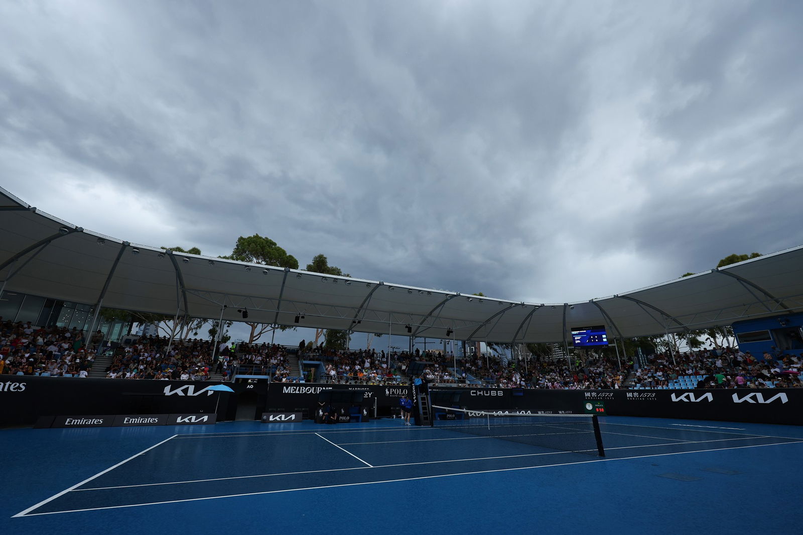Clouds over a wet court at the Australian Open.