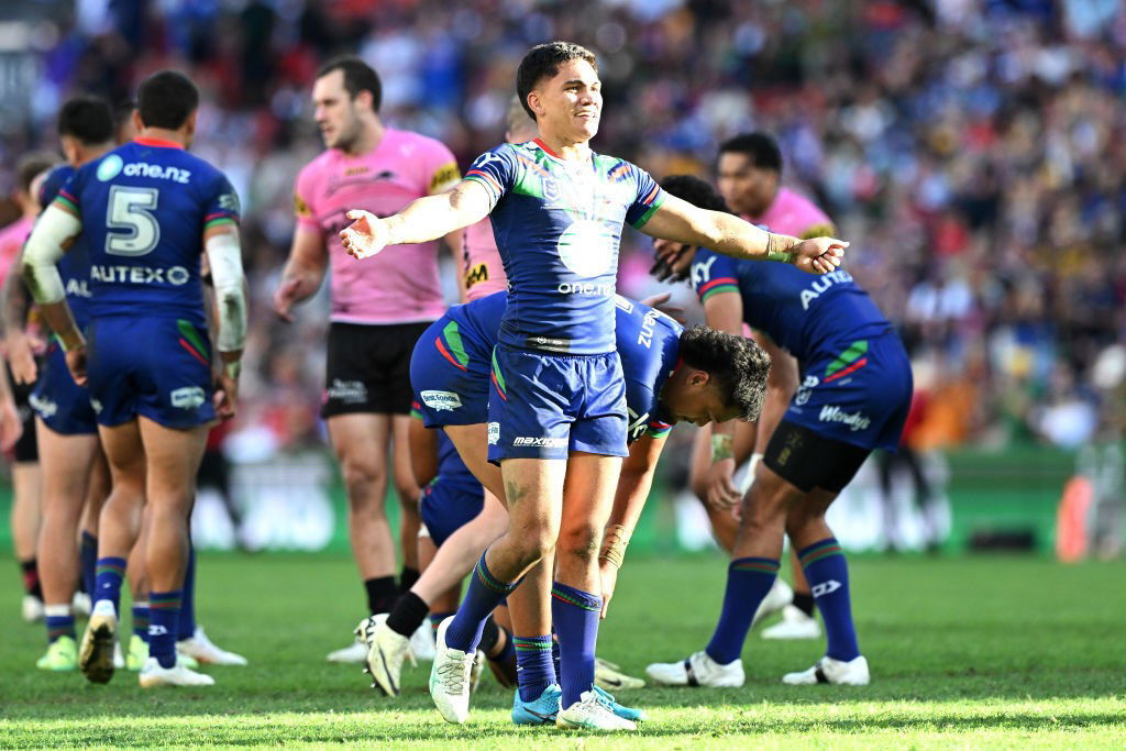 Taine Tuaupiki holds his arms out to celebrate a Warriors NRL win over the Penrith Panthers.