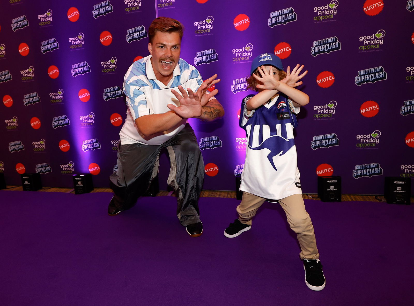 North Melbourne vs Carlton live: Good Friday Appeal footy pits Kangaroos and Blues and raises money for sick kids Rehmat Boutique Cam Zurhaar and Logan