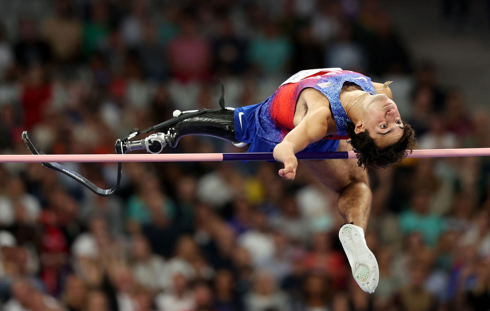 American Ezra Frech competes in the men's high jump T63 final.