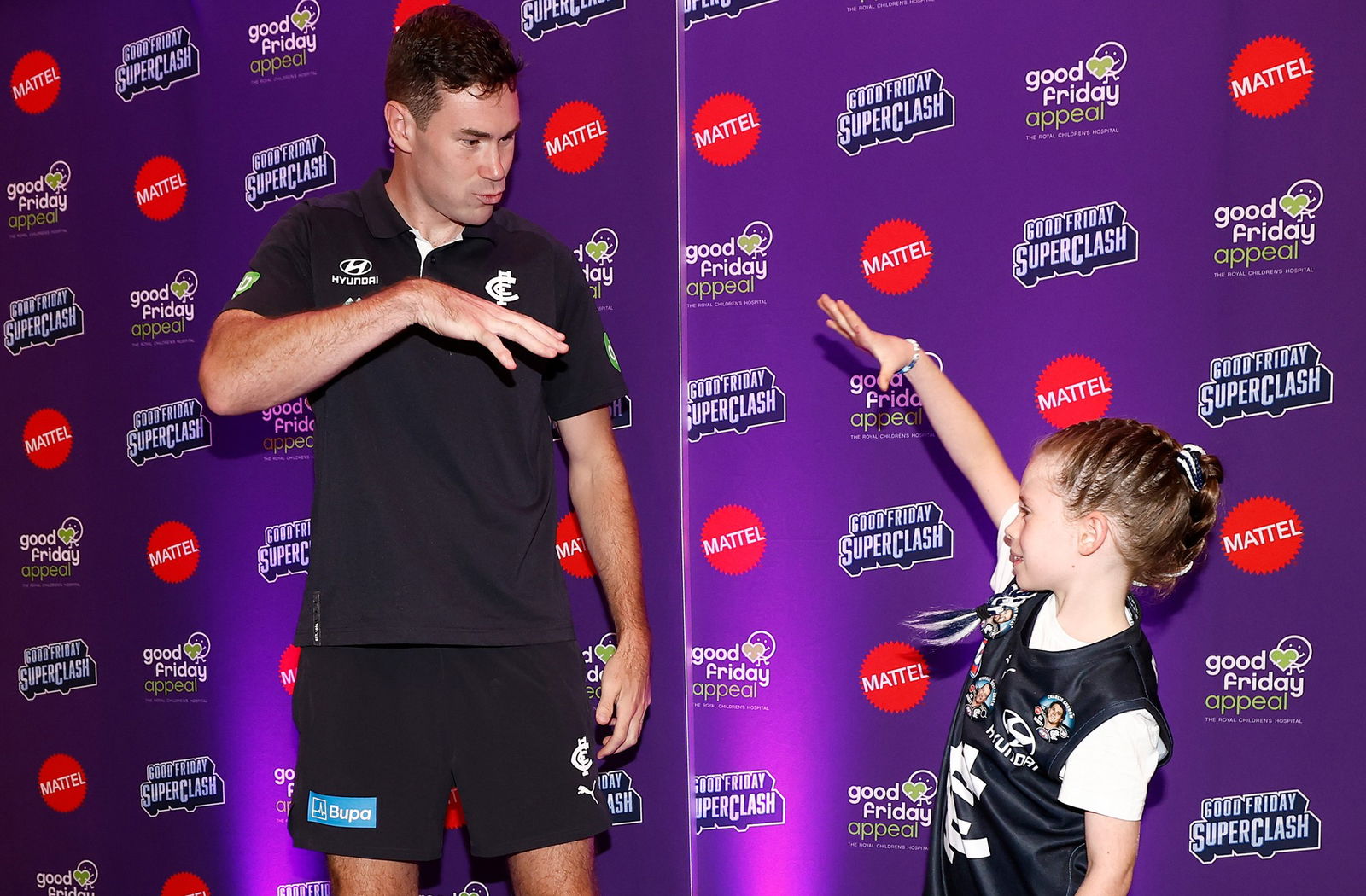 North Melbourne vs Carlton live: Good Friday Appeal footy pits Kangaroos and Blues and raises money for sick kids Rehmat Boutique Mitch McGovern and Ava