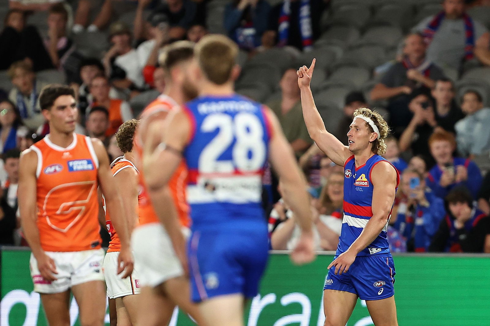 Aaron Naughton celebrates a goal.