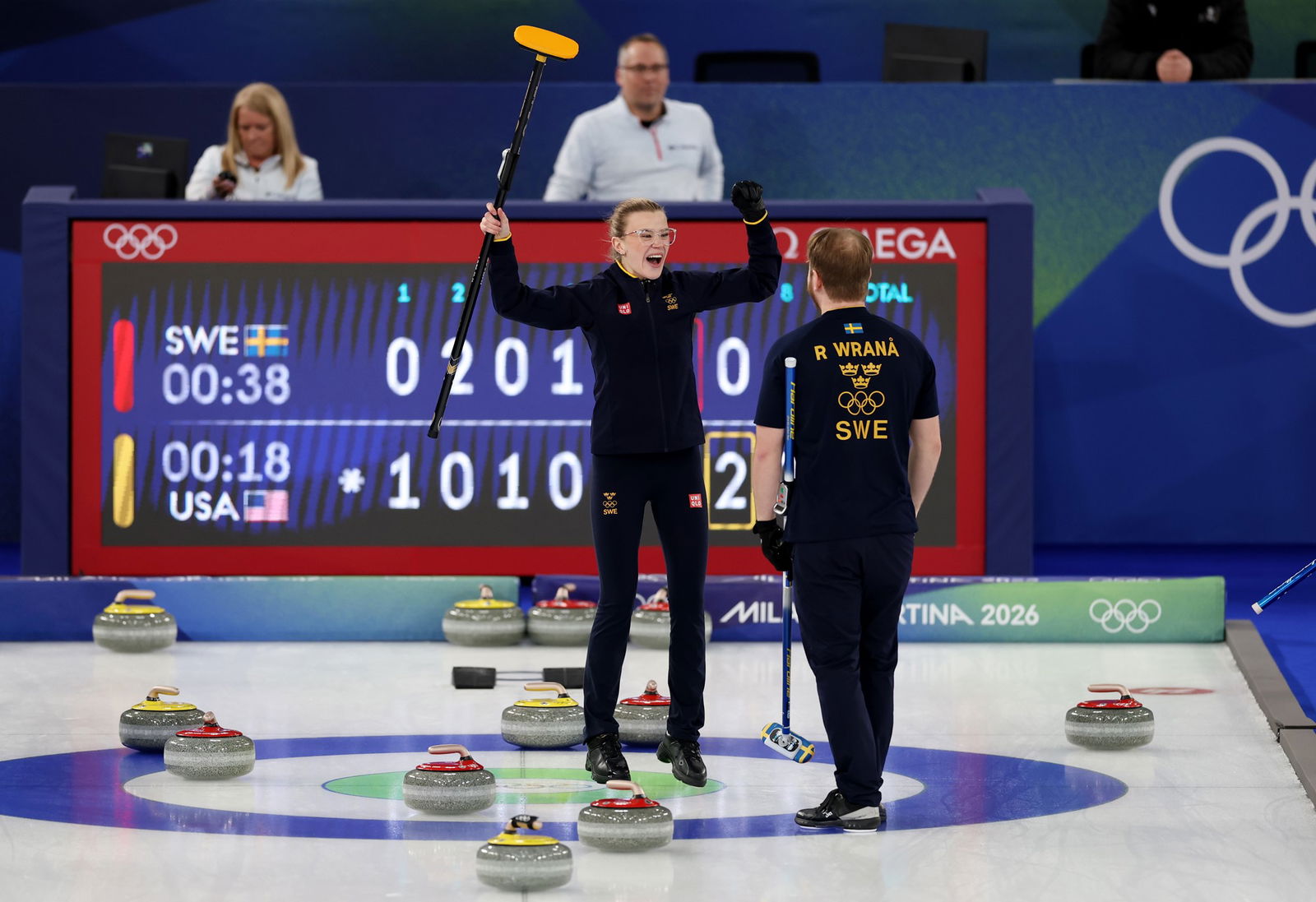 Isabella Wranaa of Team Sweden and Rasmus Wranaa of Team Sweden celebrate winning the gold medal against Team United States during the Mixed Doubles Gold Medal Game on day four of the Milano Cortina 2026 Winter Olympic games at Cortina Curling Olympic Stadium on February 10, 2026 in Cortina d'Ampezzo, Italy.