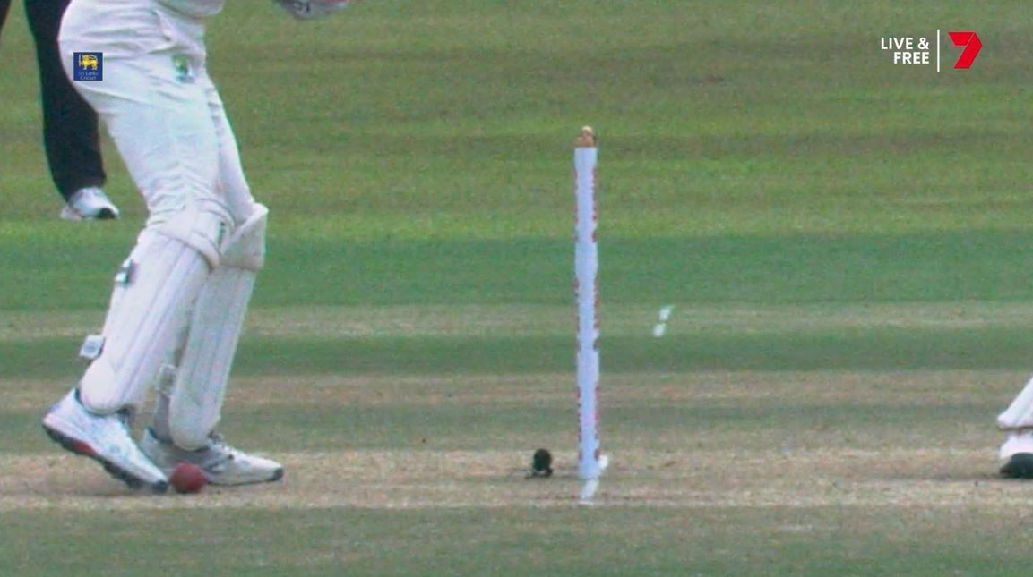 A cricket ball close to Alex Carey toe.