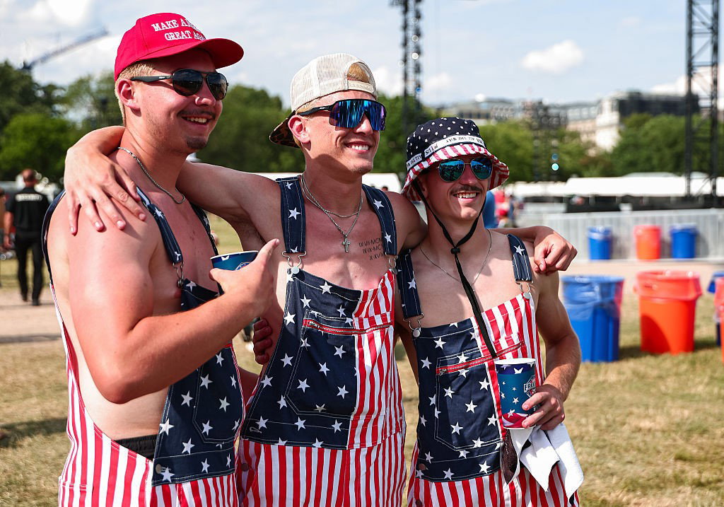 Three men in American flag overalls.