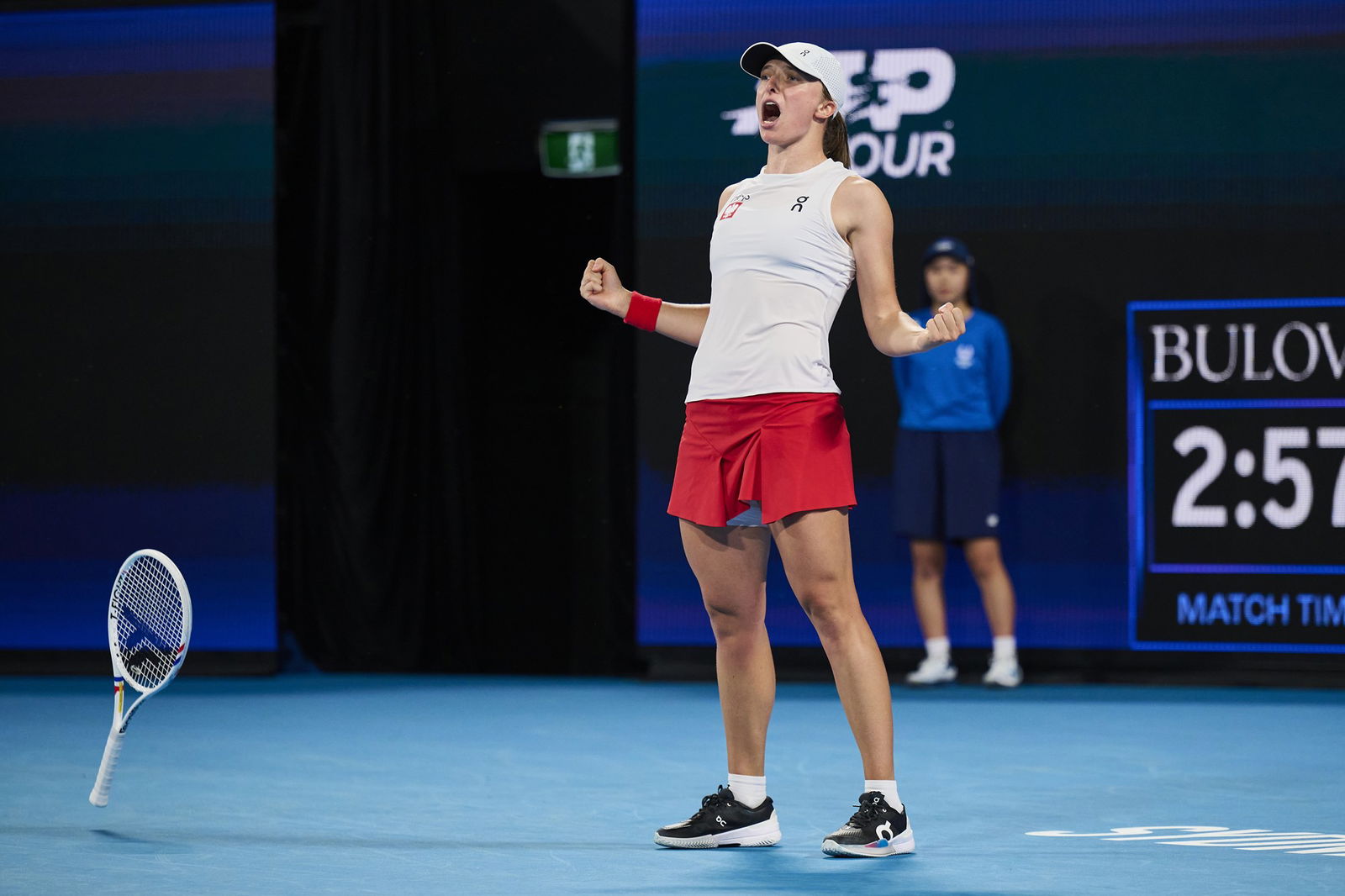 Iga Świątek celebrates defeating Katie Boulter.