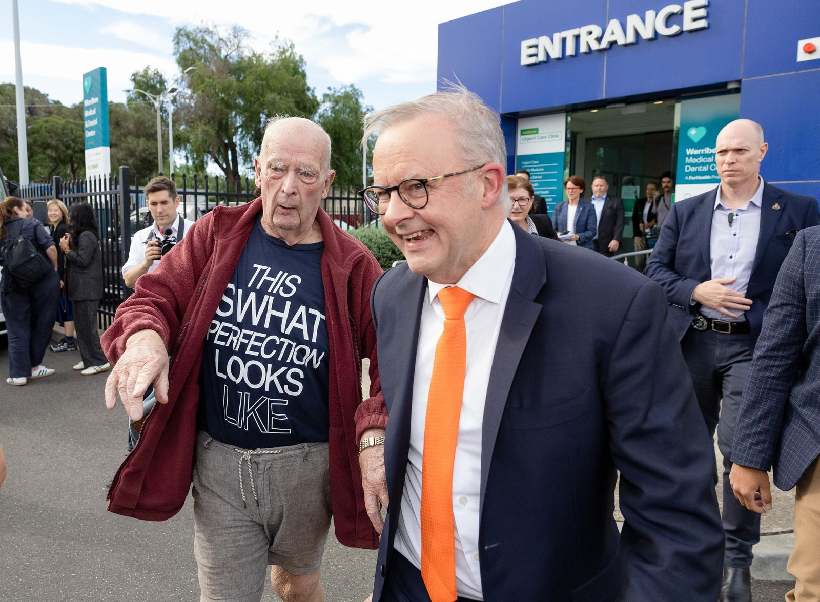 Anthony Albanese stands with an old man.