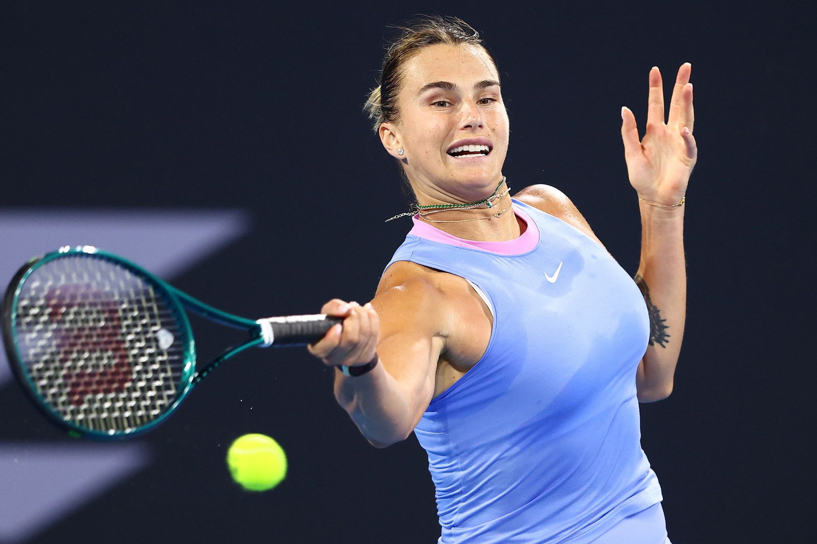 Aryna Sabalenka plays a forehand.