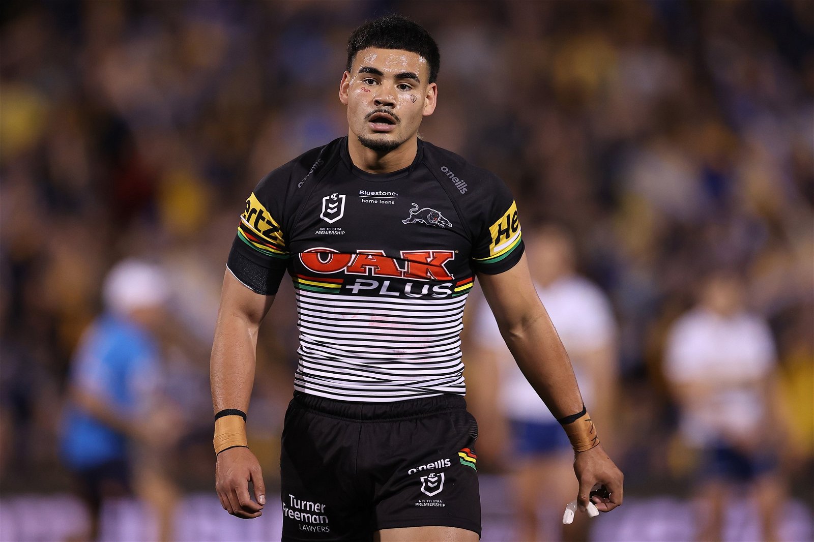 Taylan May walks on the field during a Penrith Panthers NRL game.