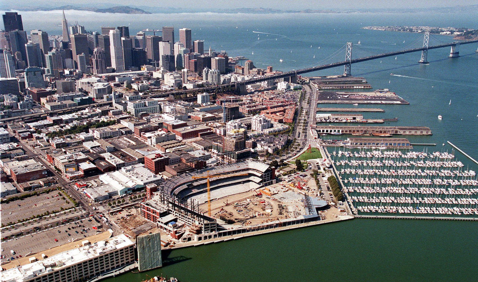 An aerial view of San Fransico city with its iconic bridge in view