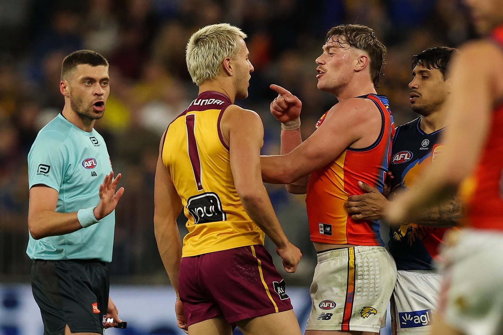 Kai Lohmann of the Lions and Harley Reid of the Eagles during the 2026 AFL Round 19 match between the West Coast Eagles and the Brisbane Lions at Perth Stadium on July 18, 2026 in Perth, Australia.