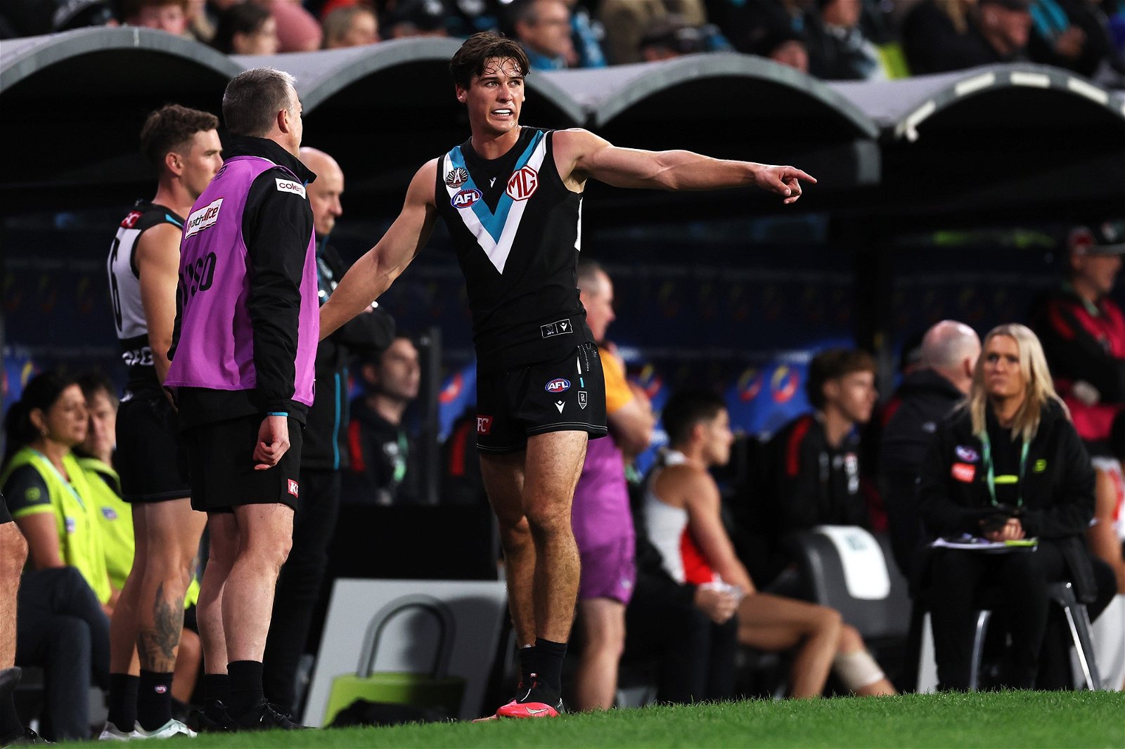 Connor Rozee comes off for Port Adelaide.