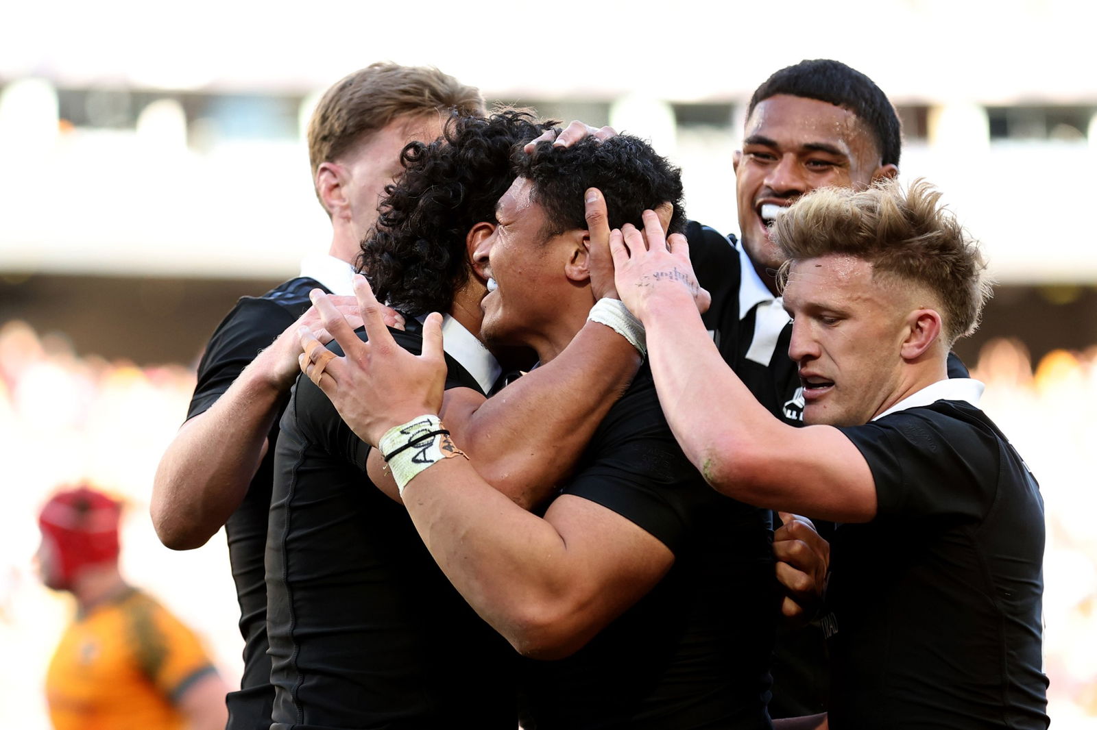 All Blacks celebrate a try.