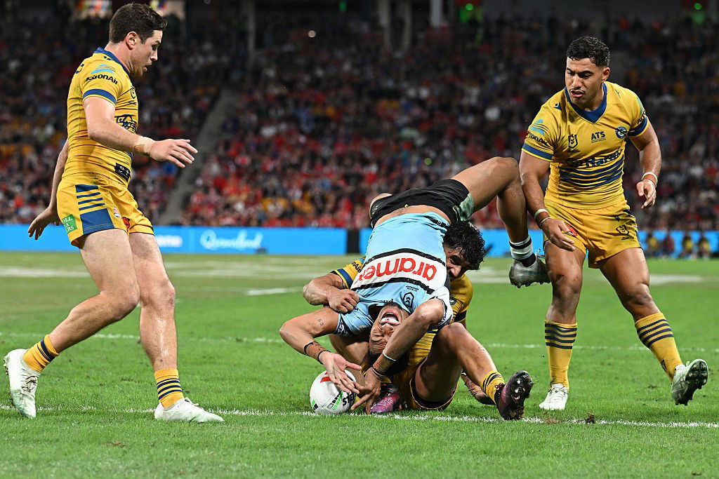Ronaldo Mulitalo grounds the ball over his head against the Eels.