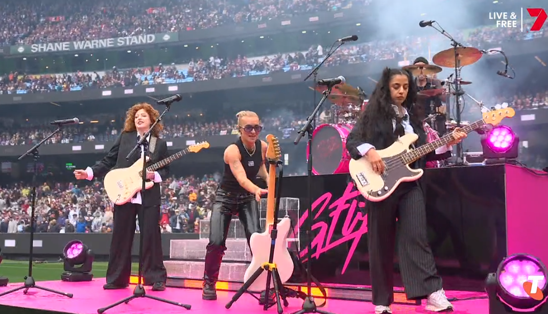 GFlip on stage with her band at the MCG.