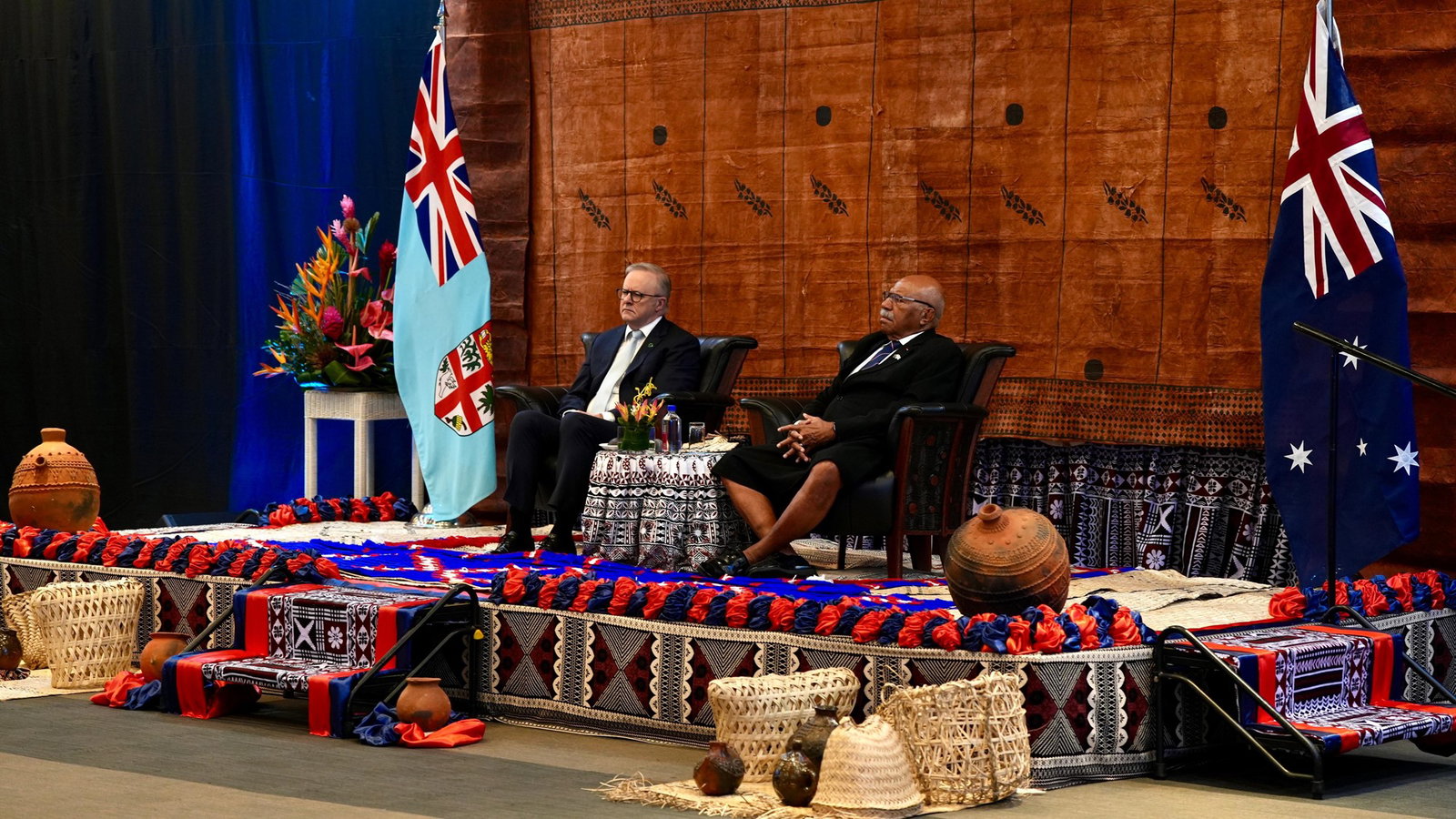 Albanese sits next to the Fijian PM.
