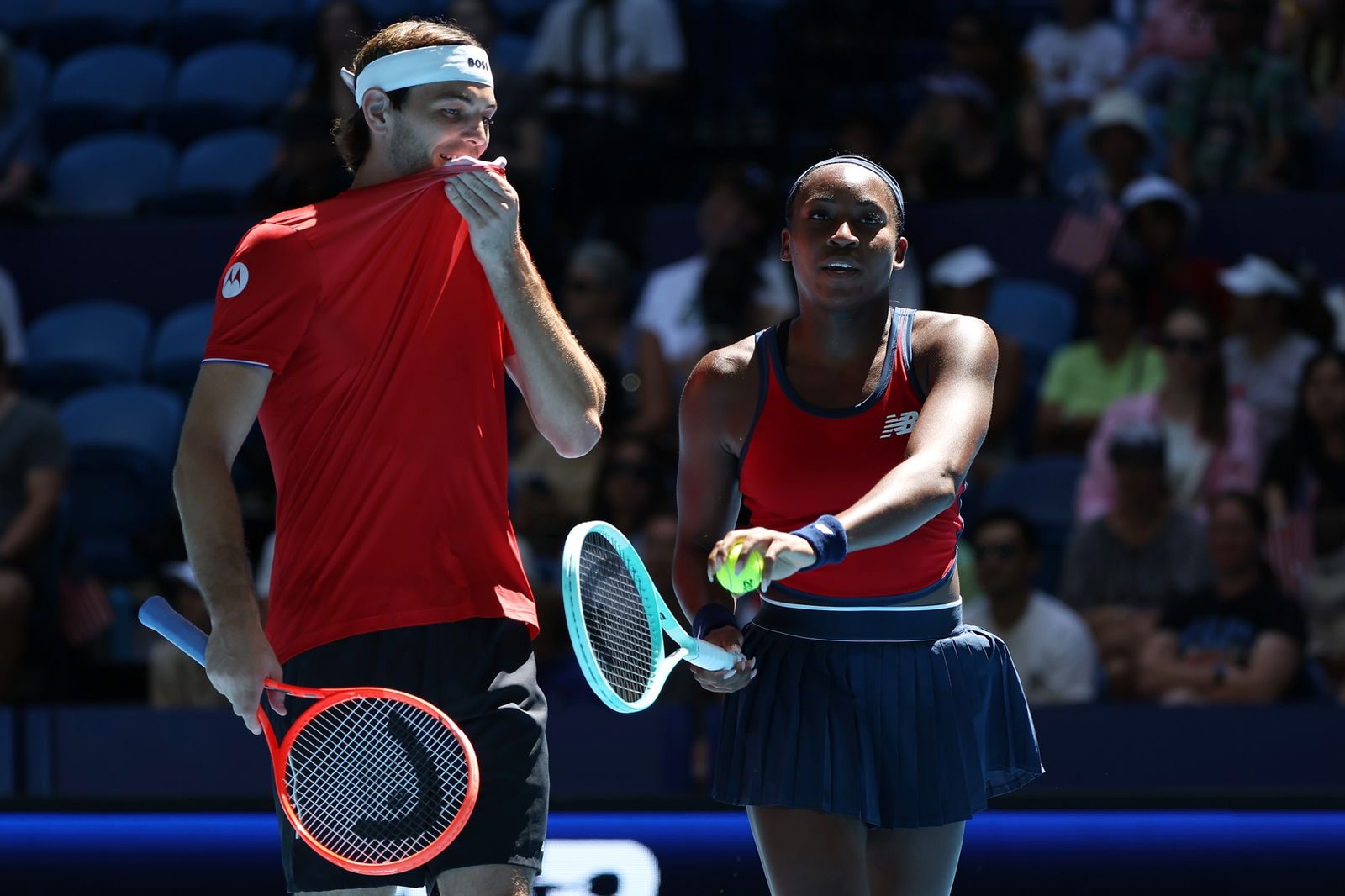 Taylor Fritz and Coco Gauff during a mixed doubles match.