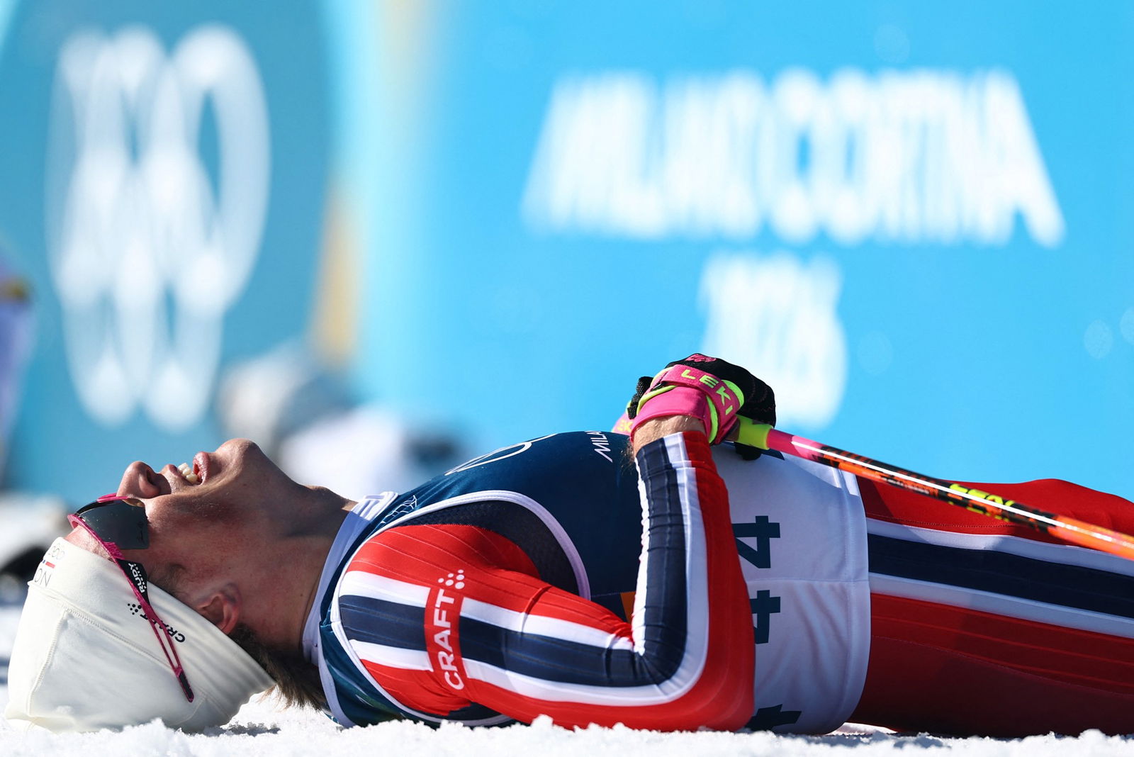 Johannes Høsflot Klæbo collapses over the finish line.