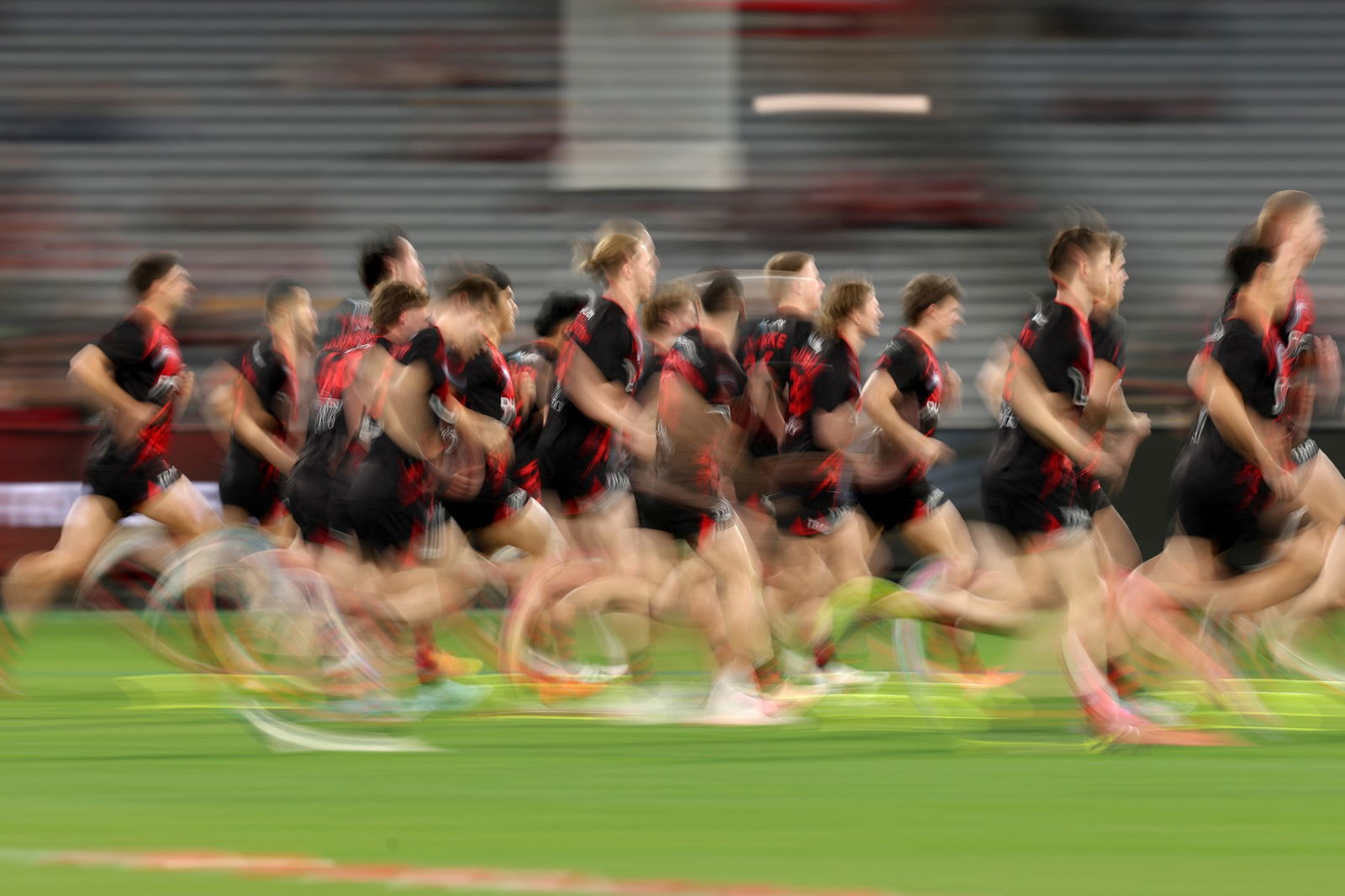 Essendon warms up