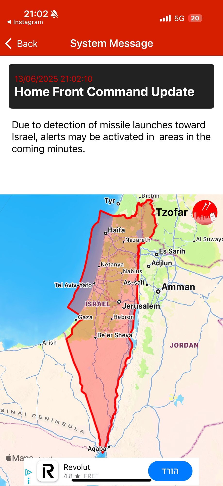 A map of Israel covered by a somewhat transaprent red warning area