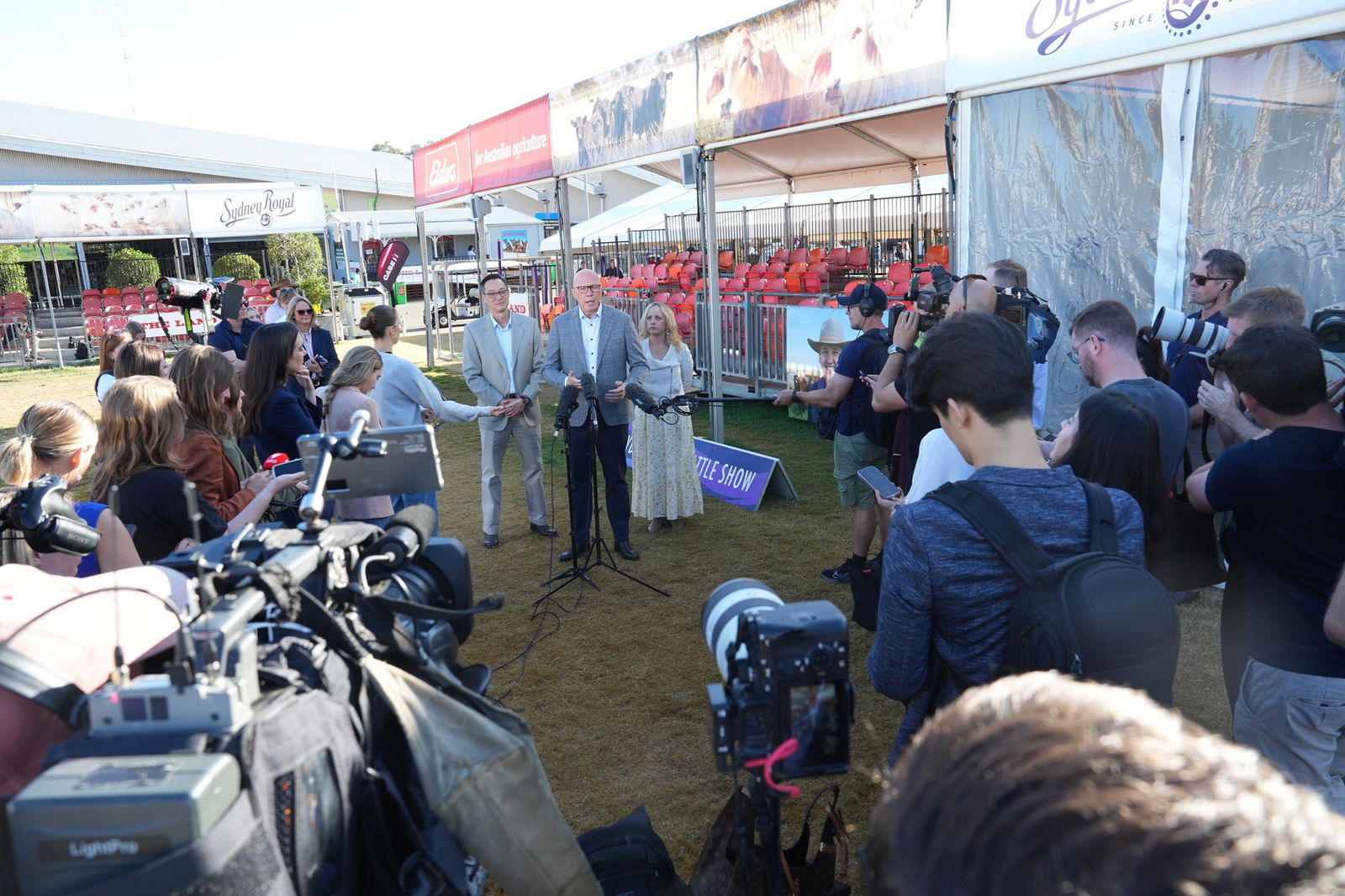 Peter Dutton takes questions from a press pack.