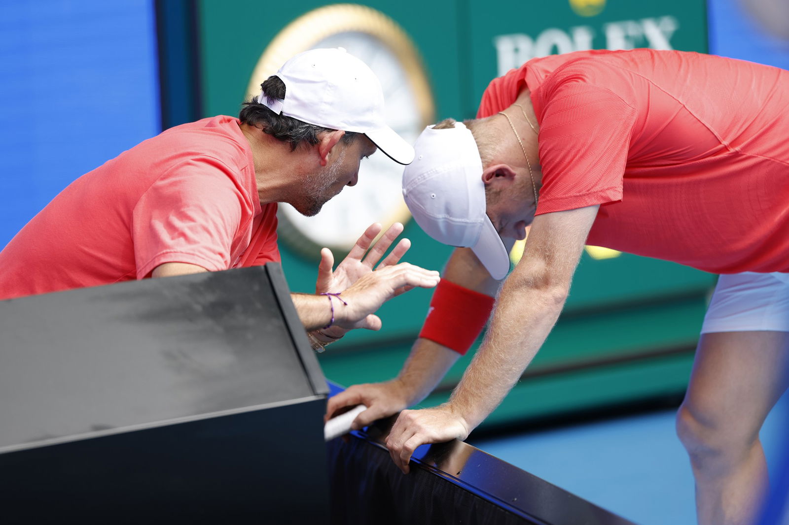 Alejandro Davidovich Fokina talks to his coach at the Australian Open.