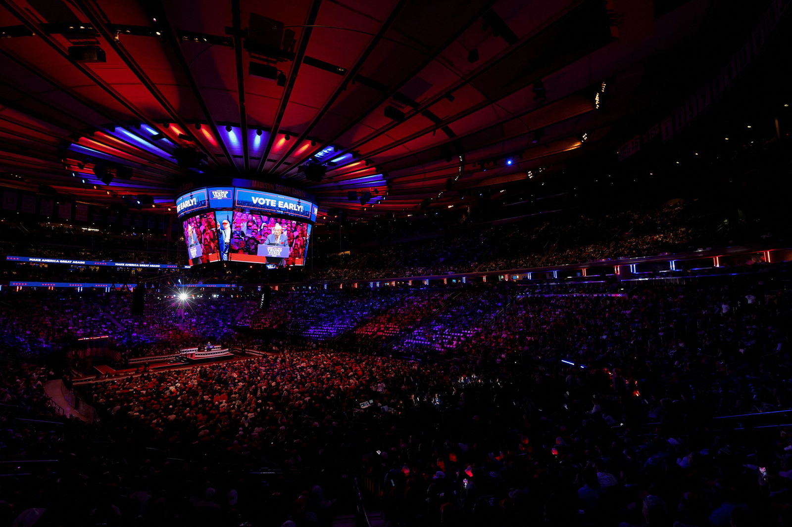 A wide shot of Madison Square Garden filled with supporters for a Trump rally