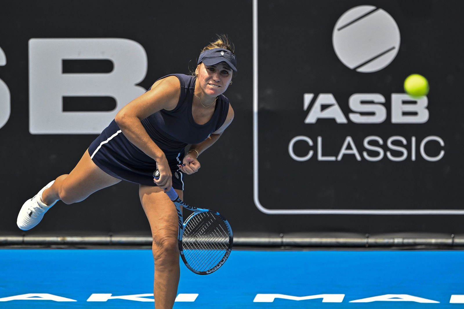 Sofia Kenin serves in Auckland.